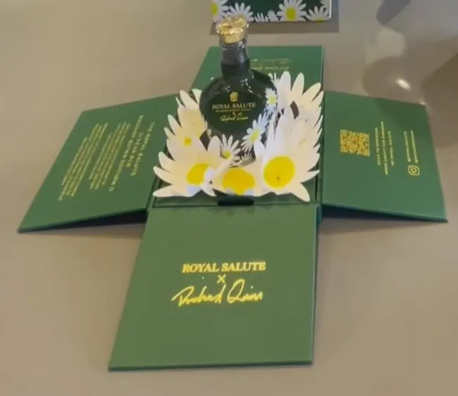Royal Salute Richard Quinn Edition II Daisy miniature in a green pop-up box with paper daisies